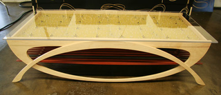 Illustration for article titled The Wave LED Coffee Table Provides Motion-Seeking Light Show